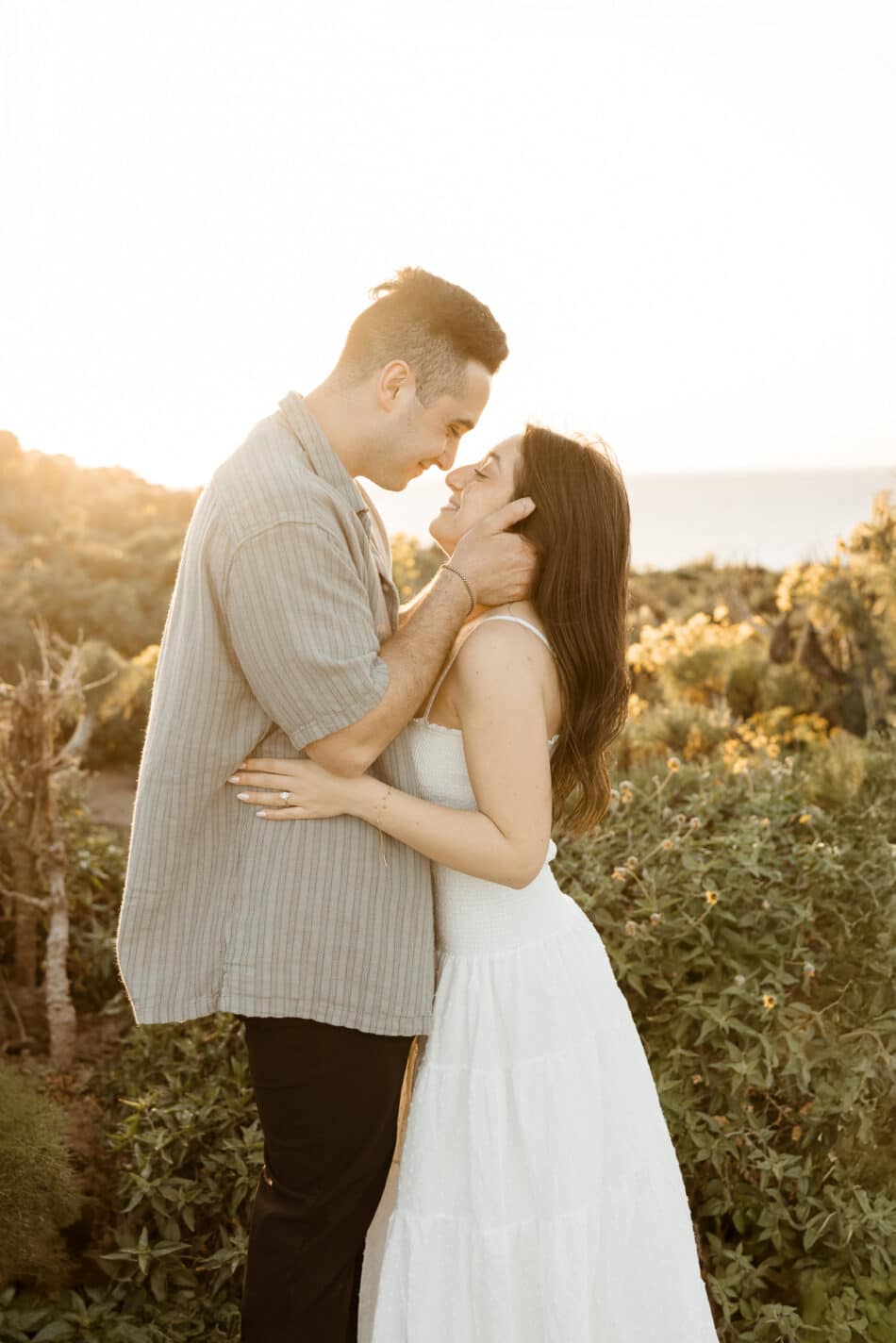 Intimate couples portrait at sunset during a Malibu engagement session by Erica Montgomery Photography.